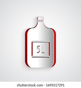 Paper cut Big bottle with clean water icon isolated on grey background. Plastic container for the cooler. Paper art style. Vector Illustration