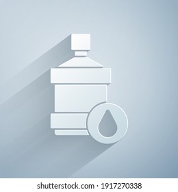 Paper cut Big bottle with clean water icon isolated on grey background. Plastic container for the cooler. Paper art style. Vector