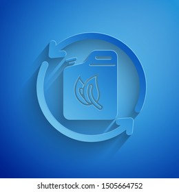 Paper cut Bio fuel canister icon isolated on blue background. Eco bio and barrel. Green environment and recycle. Paper art style. Vector Illustration