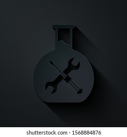 Paper cut Bioengineering with screwdriver and wrench icon isolated on black background. Adjusting, service, setting, maintenance, repair, fixing. Paper art style. Vector Illustration