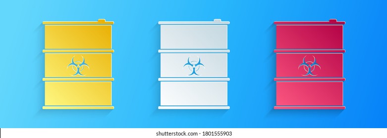 Paper cut Biological hazard or biohazard barrel icon isolated on blue background. Radioactive garbage emissions, danger of ecological disaster. Paper art style. Vector.