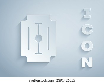 Icono de la cuchilla cortada en papel aislado en fondo gris. Estilo de arte de papel. Vector