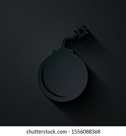 Paper cut Bomb ready to explode icon isolated on black background. Paper art style. Vector Illustration