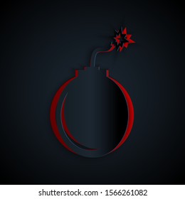 Paper cut Bomb ready to explode icon isolated on black background. Paper art style. Vector Illustration