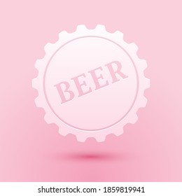 Paper cut Bottle cap with beer word icon isolated on pink background. Paper art style. Vector.