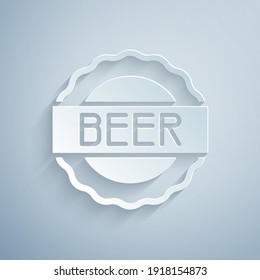Paper cut Bottle cap with inscription beer icon isolated on grey background. Paper art style. Vector.