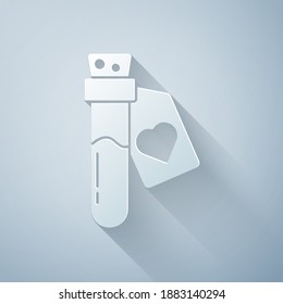 Paper cut Bottle with love potion icon isolated on grey background. Valentines day symbol. Paper art style. Vector