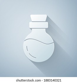 Paper cut Bottle with potion icon isolated on grey background. Flask with magic potion. Happy Halloween party. Paper art style. Vector