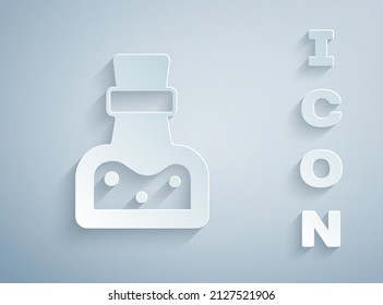 Paper cut Bottle with potion icon isolated on grey background. Flask with magic potion. Happy Halloween party. Paper art style. Vector