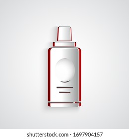 Paper cut Bottle of shampoo icon isolated on grey background. Paper art style. Vector Illustration