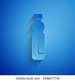 Paper cut Bottle of water icon isolated on blue background. Soda aqua drink sign. Paper art style. Vector Illustration