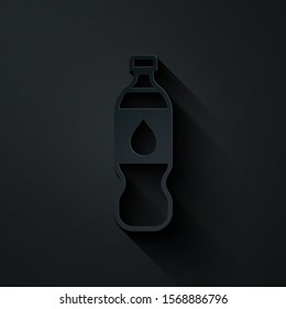 Paper cut Bottle of water icon isolated on black background. Soda aqua drink sign. Paper art style. Vector Illustration