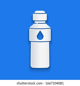 Paper cut Bottle of water icon isolated on blue background. Soda aqua drink sign. Paper art style. Vector Illustration