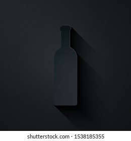 Paper cut Bottle of wine icon isolated on black background. Paper art style. Vector Illustration