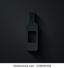 Paper cut Bottle of wine icon isolated on black background. Paper art style. Vector Illustration