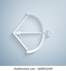 Paper cut Bow and arrow icon isolated on grey background. Cupid symbol. Love sign. Valentines day concept. Paper art style. Vector Illustration
