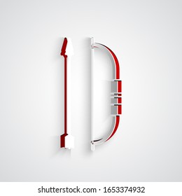 Paper cut Bow and arrow in quiver icon isolated on grey background. Paper art style. Vector Illustration