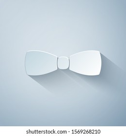 Paper cut Bow tie icon isolated on grey background. Paper art style. Vector Illustration