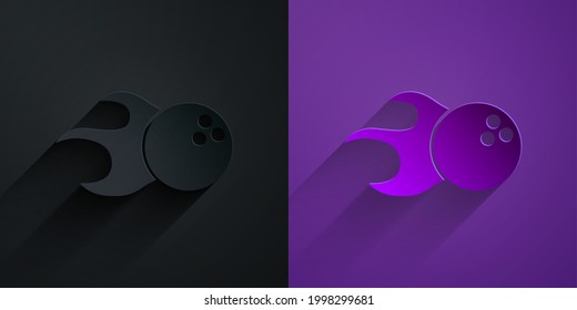 Paper cut Bowling ball icon isolated on black on purple background. Sport equipment. Paper art style. Vector