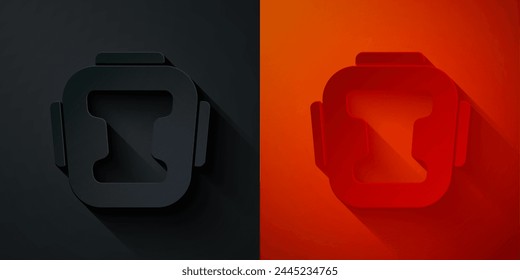 Paper cut Boxing helmet icon isolated on black and red background. Paper art style. Vector