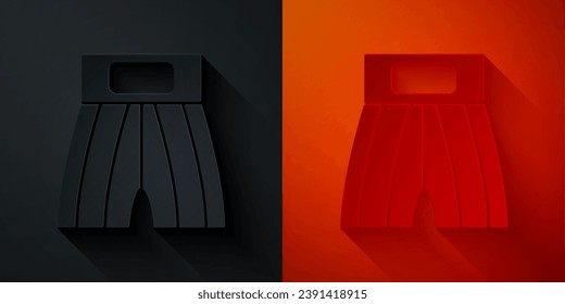 Paper cut Boxing short icon isolated on black and red background. Paper art style. Vector