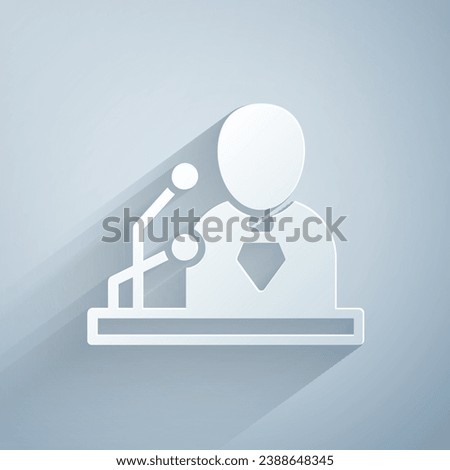 Paper cut Breaking news icon isolated on grey background. News on television. News anchor broadcasting. Mass media. Evening news. Paper art style. Vector