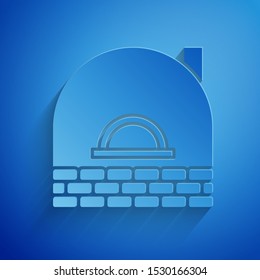 Paper cut Brick stove icon isolated on blue background. Brick fireplace, masonry stove, stone oven icon.Paper art style. Vector Illustration