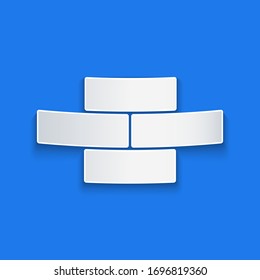 Paper cut Bricks icon isolated on blue background. Paper art style. Vector Illustration