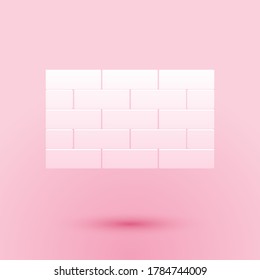 Paper cut Bricks icon isolated on pink background. Paper art style. Vector.