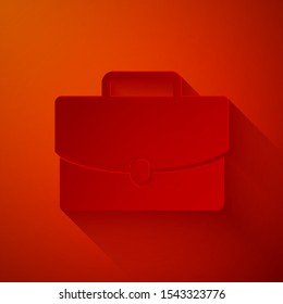 Paper cut Briefcase icon isolated on red background. Business case sign. Business portfolio. Paper art style. Vector Illustration