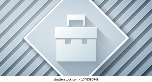 Recorte de papel Icono de maletín aislado en fondo gris. Signo de caso comercial. Cartera de negocios. Estilo de arte de papel. Ilustración vectorial