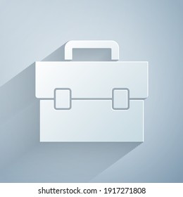 Recorte de papel Icono de maletín aislado en fondo gris. Signo de caso comercial. Cartera de negocios. Estilo de arte de papel. Vector