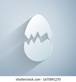 Paper cut Broken egg icon isolated on grey background. Happy Easter. Paper art style. Vector Illustration