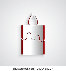 Paper cut Burning candle icon isolated on grey background. Cylindrical aromatic candle stick with burning flame. Happy Halloween party. Paper art style. Vector