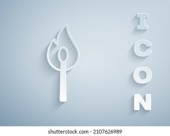 Paper cut Burning match with fire icon isolated on grey background. Match with fire. Matches sign. Paper art style. Vector