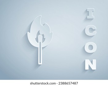 Paper cut Burning match with fire icon isolated on grey background. Match with fire. Matches sign. Paper art style. Vector