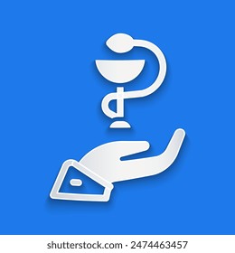 Paper cut Caduceus snake medical symbol icon isolated on blue background. Medicine and health care. Emblem for drugstore or medicine, pharmacy. Paper art style. Vector