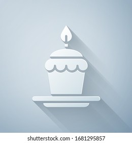 Paper cut Cake with burning candles icon isolated on grey background. Happy Birthday. Paper art style. Vector Illustration