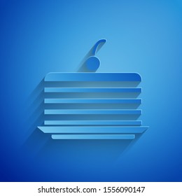 Paper cut Cake icon isolated on blue background. Happy Birthday. Paper art style. Vector Illustration