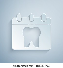 Paper cut Calendar with tooth icon isolated on grey background. International Dentist Day, March 6. March holiday calendar. Paper art style. Vector.