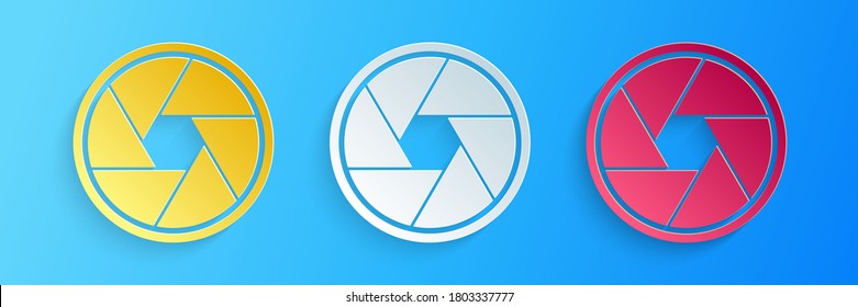 Paper cut Camera shutter icon isolated on blue background. Paper art style. Vector.