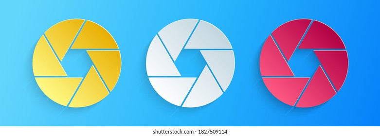 Paper cut Camera shutter icon isolated on blue background. Paper art style. Vector.