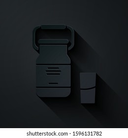 Paper cut Can container for milk and glass icon isolated on black background. Paper art style. Vector Illustration