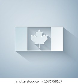 Paper cut Canada flag icon isolated on grey background. Paper art style. Vector Illustration
