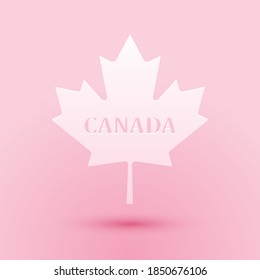 Paper cut Canadian maple leaf with city name Canada icon isolated on pink background. Paper art style. Vector.