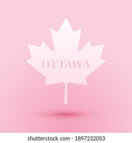 Paper cut Canadian maple leaf with city name Ottawa icon isolated on pink background. Paper art style. Vector.