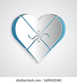 Paper cut Candy in heart shaped box and bow icon isolated on grey background. Valentines Day. Paper art style. Vector Illustration