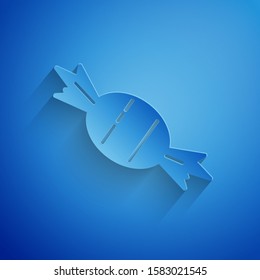 Paper cut Candy icon isolated on blue background. Paper art style. Vector Illustration