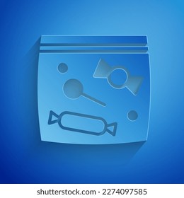 Paper cut Candy packaging for sweets icon isolated on blue background. Bag with candy. Paper art style. Vector