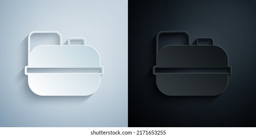 Paper cut Canister for gasoline icon isolated on grey and black background. Diesel gas icon. Paper art style. Vector